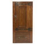 An Arts and Crafts oak wardrobe,