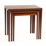 A Danish nest of three teak tables,