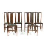 A set of six walnut Arts and Crafts chairs,