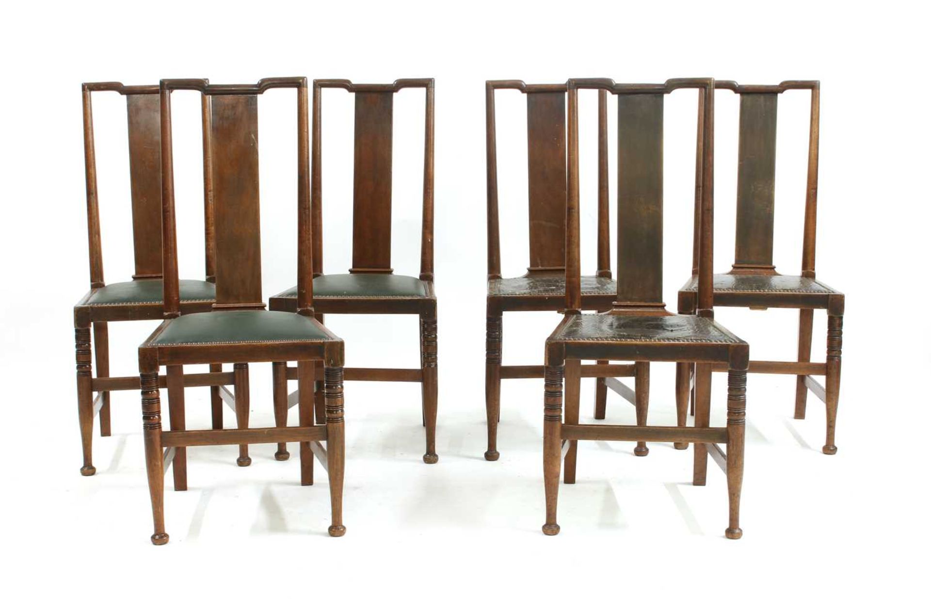 A set of six walnut Arts and Crafts chairs,