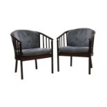 A pair of modern armchairs,