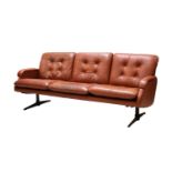A Danish tan leather three-seater settee,