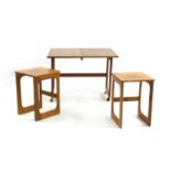 A nest of three G Plan teak tables,