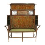 A Liberty & Co. mahogany settle,