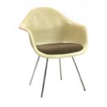 An Eames DAW armchair,