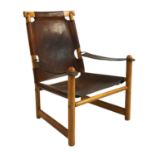 An Italian leather and pine chair,