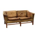 A Danish brown leather two-seater settee,