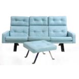 A blue leather settee,