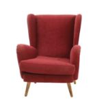 An Howard Keith wingback armchair,