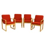A set of four oak laminate chairs,
