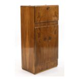 An Art Deco walnut cocktail cabinet,