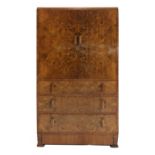 An Art Deco burr walnut dressing cabinet,