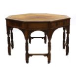 A walnut octagonal centre table,