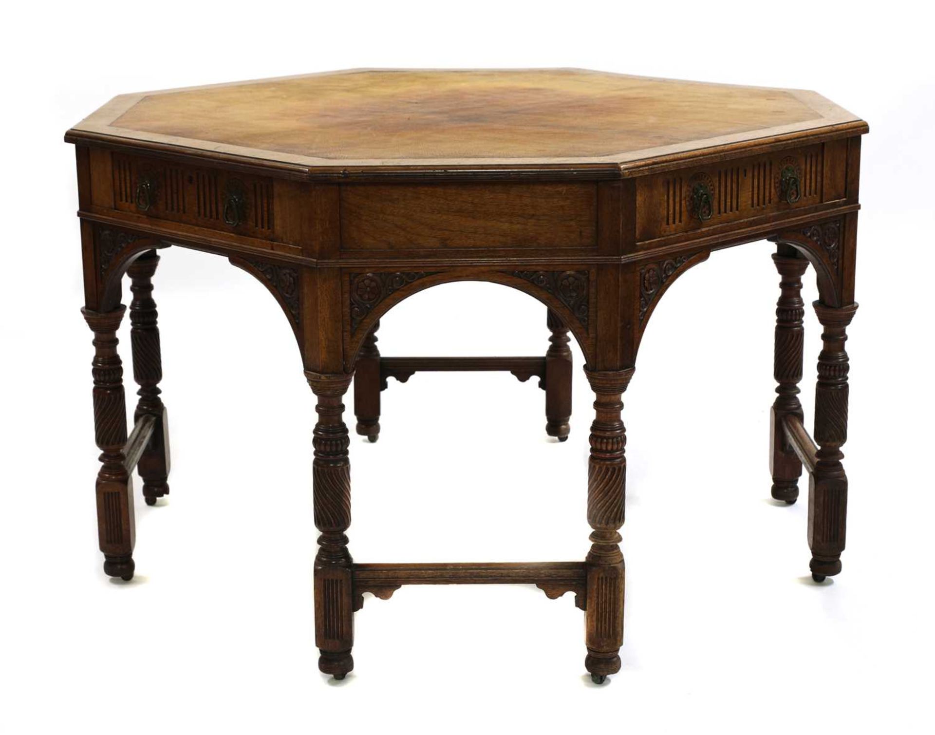 A walnut octagonal centre table,