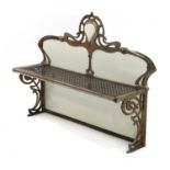 A French Art Nouveau metal and enamelled wall shelf,