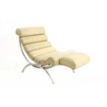 A cream leather lounger,