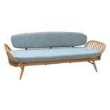 An Ercol light elm studio settee/daybed,