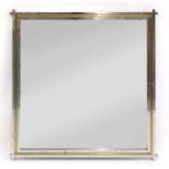 An Italian chrome and brass mirror,
