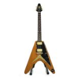 A 1984 Tokai Korina Flying V electric guitar,
