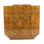 A large Art Deco burr walnut wardrobe,