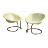 A pair of Italian chrome and fibreglass chairs,