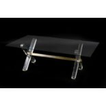 A Lucite and glass coffee table,