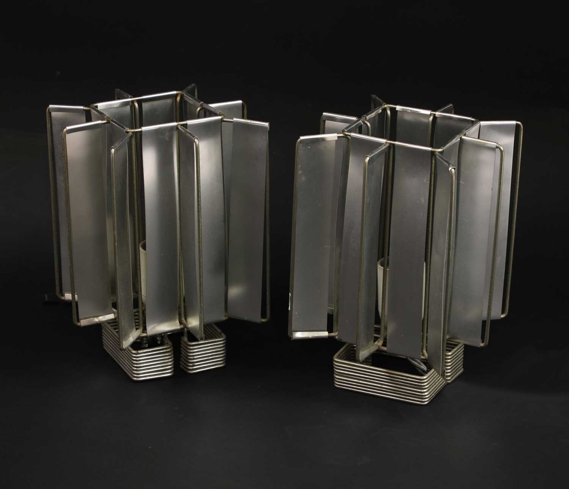 A pair of French aluminium 'Sirius' table lamps,