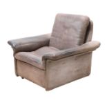 A De Sede leather armchair,