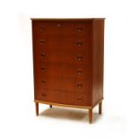 A Danish teak bow front chest,