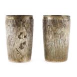 *A pair of silver beakers,