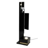 An unusual ebonised and chrome coat rack and light,