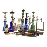 A collection of Middle Eastern hookah water pipes,