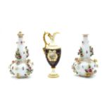 A pair of Meissen style foliate vases, and a Coalport jug