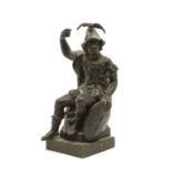 A bronze figure of a seated Roman soldier