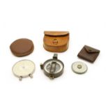 A Fowler's 'Twelve-Ten' patent calculator, a pocket calculator & compass