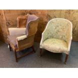 A mahogany wingback armchair,