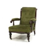 A green draylon upholstered mahogany library armchair,