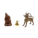 An Eastern lion aquamanile type table lighter,