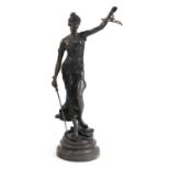 A large bronze garden figure of justice,