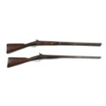 A double barrelled pinfire shotgun and a percussion musket