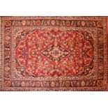 A Kashan rug,