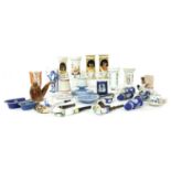 A collection of porcelain match holders or spill vases,