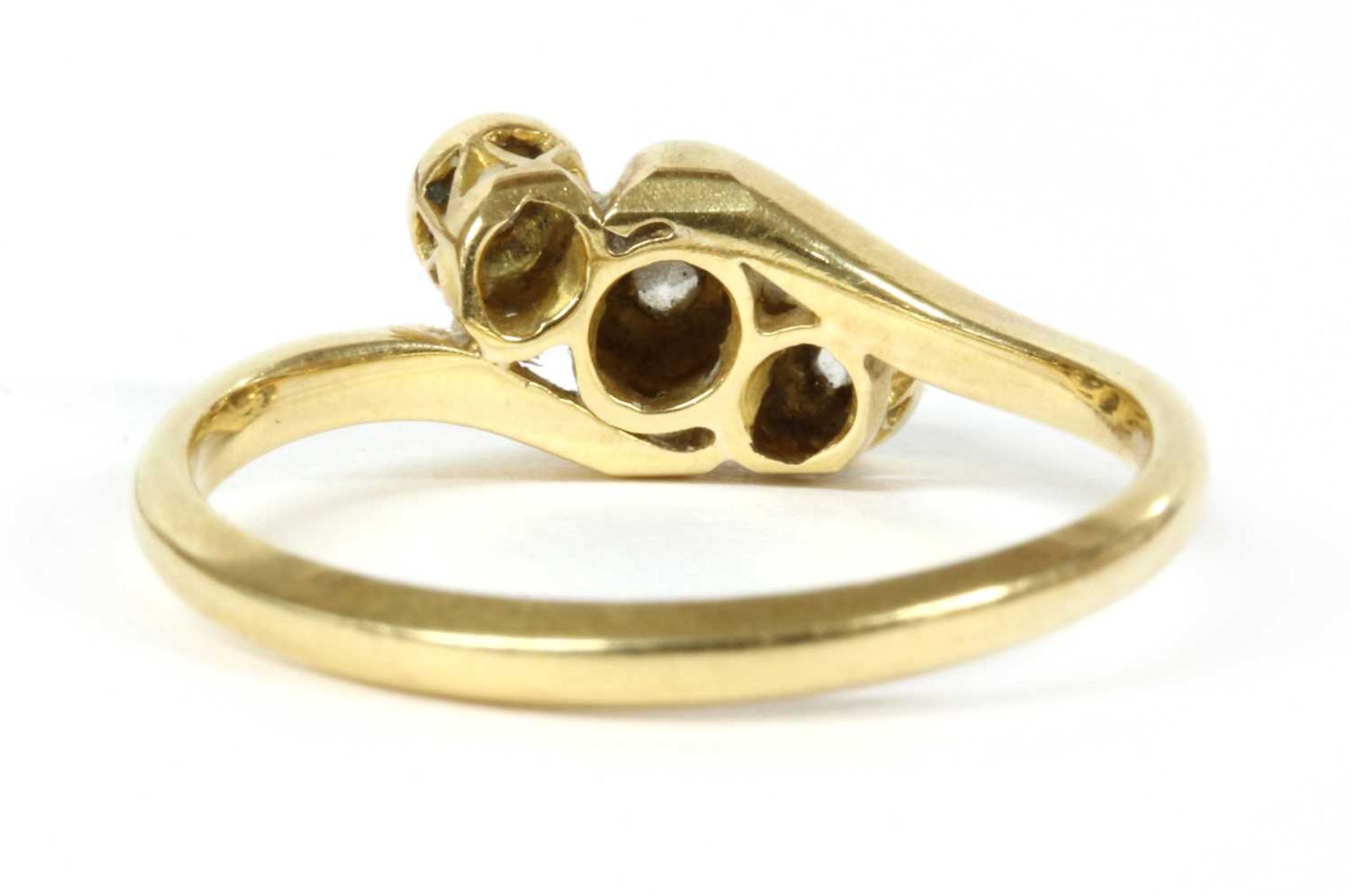 A gold three stone diamond ring, c.1925, - Image 2 of 3