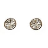 A pair of white gold diamond earrings,