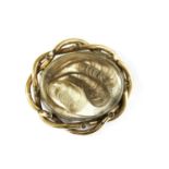 A gold mourning brooch,