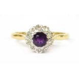 An 18ct gold amethyst and diamond cluster ring,