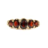 A 9ct gold five stone garnet ring,