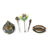 A quantity of Scottish silver brooches,