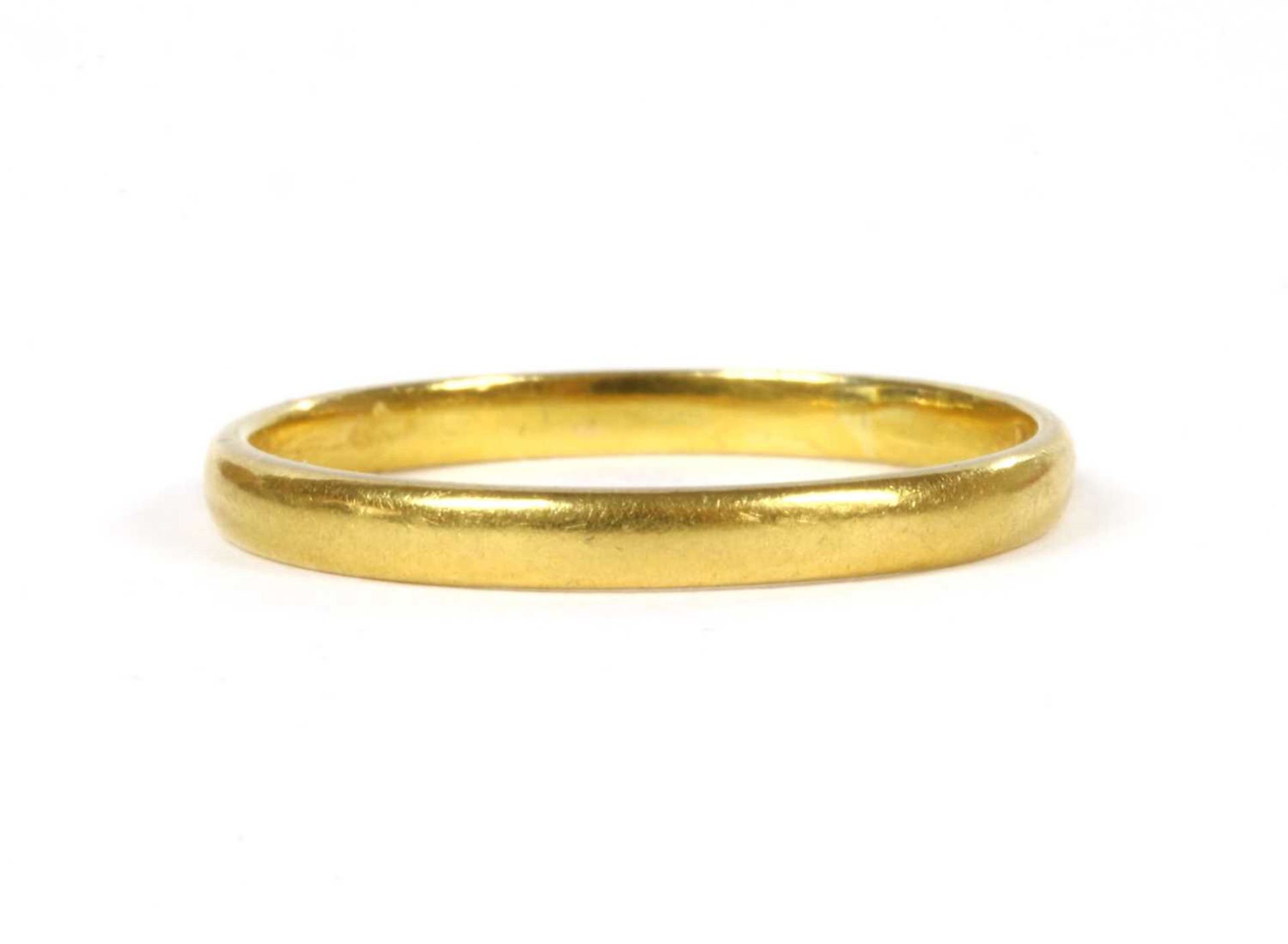 A 22ct gold light court section wedding ring,