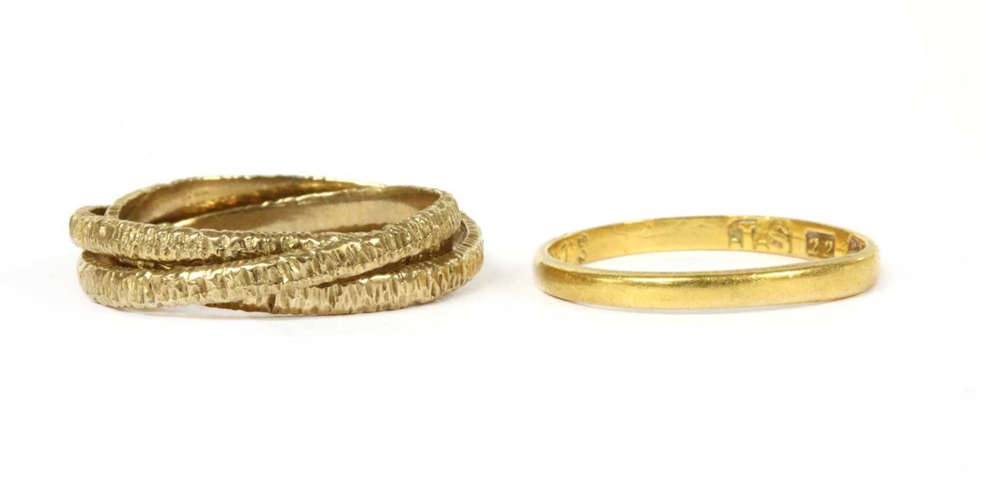 A 22ct gold D section wedding ring,